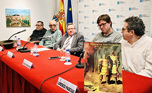 2. En la mesa, con el libro en primer término, Lorenzo Pascual, Miguel Fernández, Ramón Jiménez Pepe Rey y Manuel López Poy