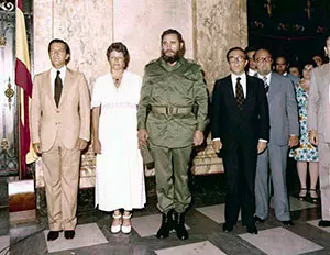 Oreja con Suarez y Fidel