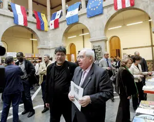 Luis Sepúlveda y Vicente Álvarez Areces, en la inauguración del Salón del Libro Iberoamericano.