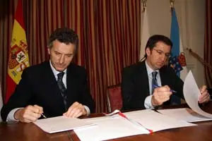 Macri y Feij&oacute;o, durante la firma del protocolo.