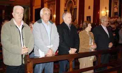 Los directivos de la entidad durante la celebración de la misa. 