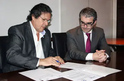 Tristán Bauer y Fernández Frasero, durante la firma del acuerdo.