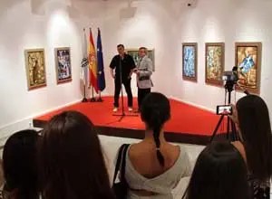 Presentación, con público