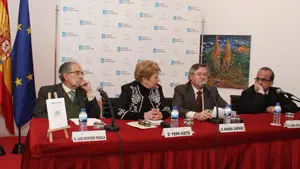 3. Montero Padilla, Pepa Nieto, Ramón Jiménez y Juan José Martín en la mesa