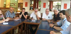 Reunión con las colectividades gallegas. Segundo por la derecha, Rodríguez Miranda