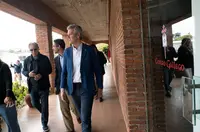 O presidente da Xunta, Alfonso Rueda, acompañado polo conselleiro de Emprego, Comercio e Emigración, José González, reúnese con entidades galegas no Uruguai. Sede deportiva do Centro Galego en Carrasco (Montevideo), 09/03/25.