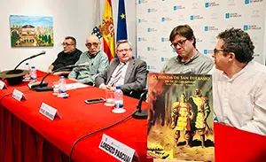 2. En la mesa, con el libro en primer término, Lorenzo Pascual, Miguel Fernández, Ramón Jiménez Pepe Rey y Manuel López Poy