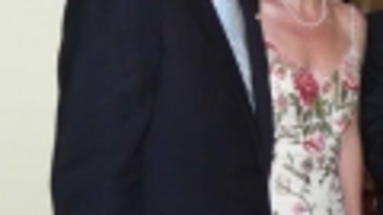 De Lario, junto a su esposa.