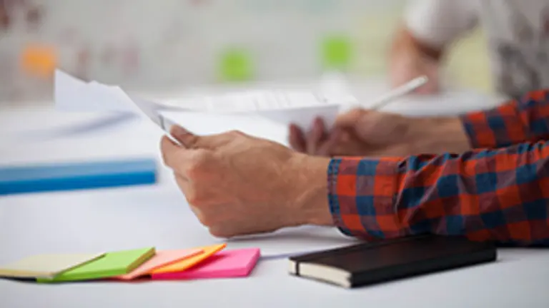 Team succes. Photo young business managers working with new startup project.