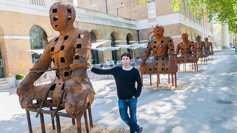 Departure, the first UK solo exhibition of artist Xavier Mascaró (pictured). Highlights include: an installation of boats made from bronze and iron “which are evocative of long-forgotten shipwrecks”; iron portraits of a young woman from the Eleonora series “reminiscent of the profiles on ancient coins”; delicate metal works “resembling votive figures from his Idols series”; and his Guardians series (pictured), of 10 feet high rusted iron warriors “inspired by medieval armour and ancient Egyptian and Greek art”.  The latter being the first outdoor installation by the Gallery since moving to Chelsea. The show runs from 3 September until 5th October at The Saatchi Gallery, Chelsea, London. 01 September 2014.