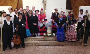Participantes en la misa de la Virgen del Rocío.